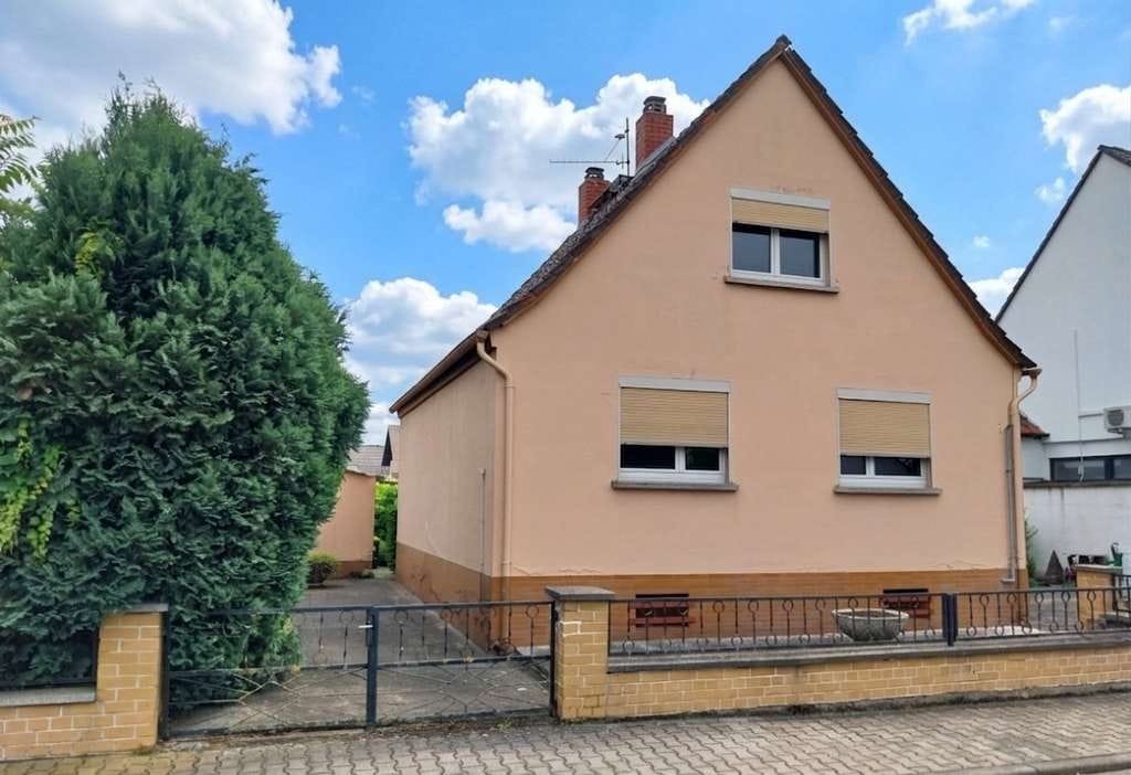 Immobilie in Biblis - Familienfreundliches Einfamilienhaus mit Charme - Bild 1