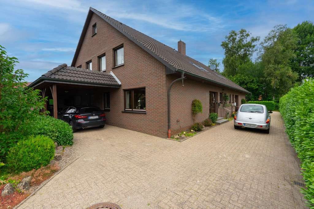 Immobilie in Friesoythe - Großzügige Doppelhaushälfte mit 163 m², Garage & Carport in Friesoythe - Bild 1