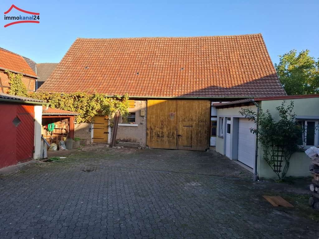 Immobilie in Marktbreit - Vielseitiges Einfamilienhaus mit großem Garten und Nebengebäude in 97340 Martinsheim - Bild 2
