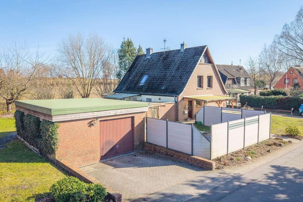 Immobilie in Osterby - Platzwunder mit großem Garten - Bild 1