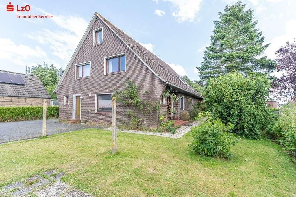 Immobilie in Wangerland - Chamantes Einfamilienhaus mit Einliegerwohnung und Garage in ruhiger Lage von Carolinensiel - Bild 0