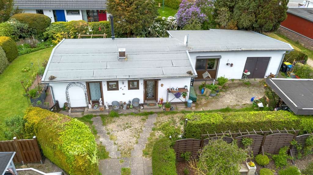 Immobilie in Brodersby - Ihr Rückzugsort an der Ostsee – stilvoll modernisiert mit Gartenidylle und viel Potenzial - Bild 1