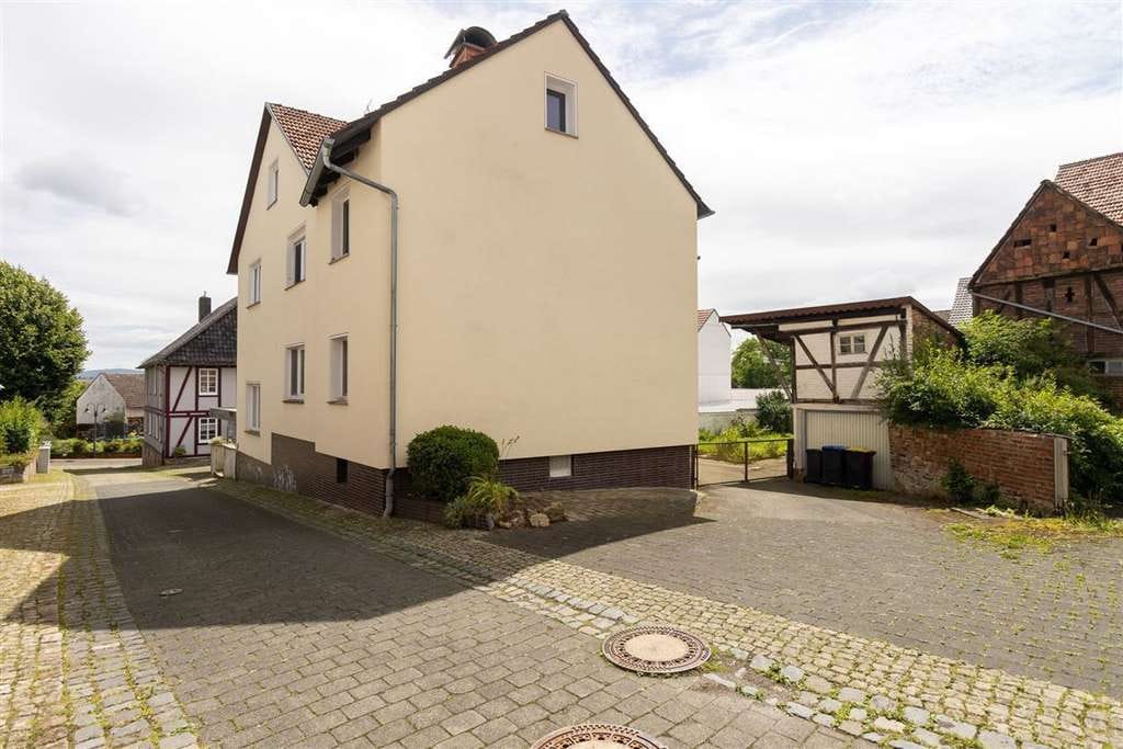 Immobilie in Berkatal - Geräumig, bezahlbar und ruhig gelegen: Massives Ein- bis Zweifamilienhaus mit Garten und Garage - Bild 3