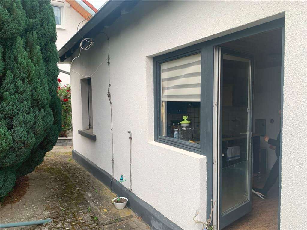 Immobilie in Langenenslingen - Charmantes Einfamilienhaus mit Garten in zentraler Lage. - Bild 1