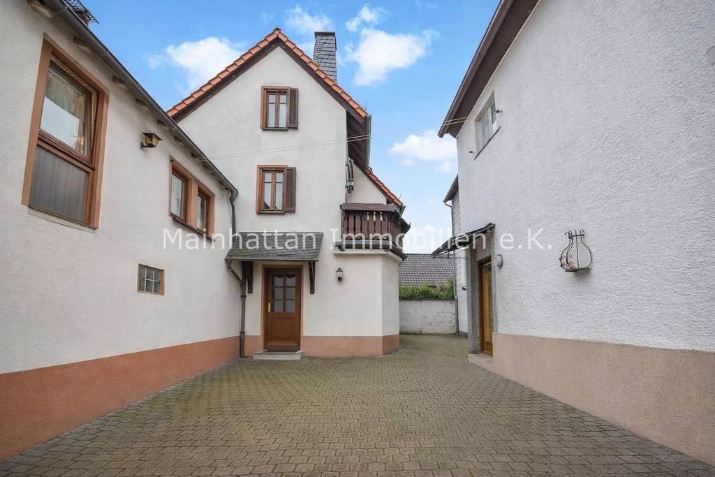 Immobilie in Bad Homburg vor der Höhe - Mehrgenerationshaus - Invest oder mietfrei wohnen! - Bild 0