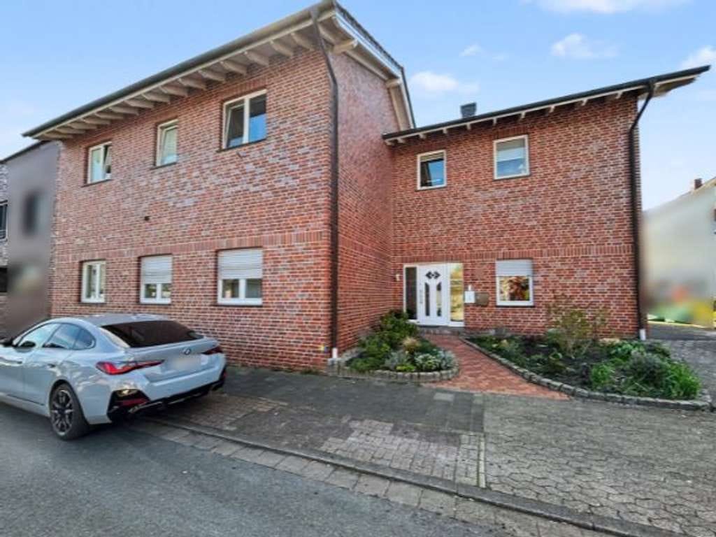 Immobilie in Rheine - Hochwertig saniertes und ca. 276 m² großes Zweifamilienhaus in ruhiger Lage von Rheine-Wadelheim - Bild 0