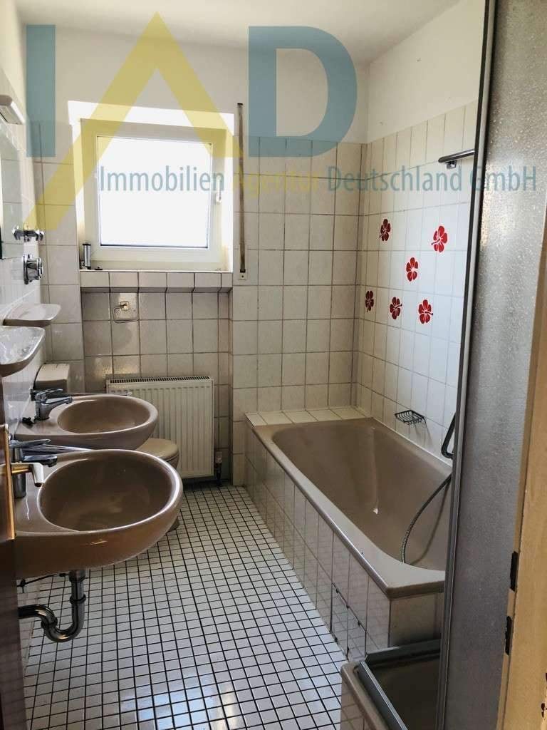 Immobilie in Lollar - Lichtdurchflutete 3-Zimmer-Wohnung mit Terrasse und Tiefgaragenstellplatz - Bild 1