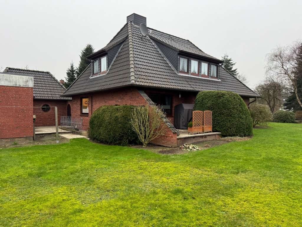Immobilie in Oldersbek - Tlw. unterkellertes Einfamilienhaus mit Anbau, Sauna, Garage und Terrasse nahe der Kreisstadt Husum - Bild 2
