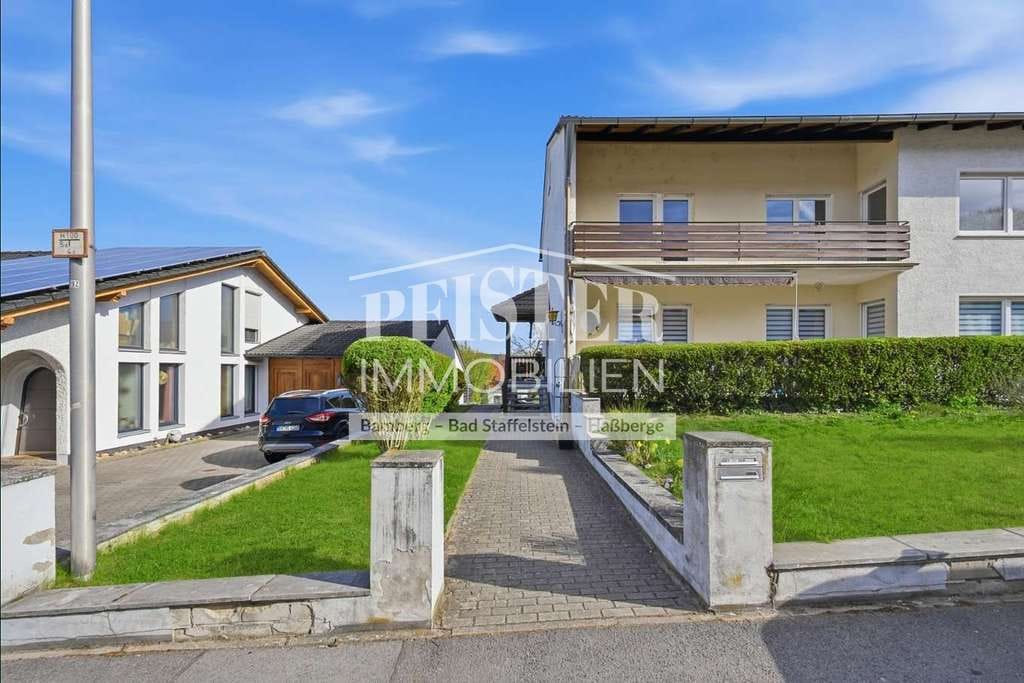 Immobilie in Viereth-Trunstadt - Attraktives, sanierungsbedürftiges Zweifamilienhaus in Viereth mit großem Garten/ teilvermietet - Bild 1
