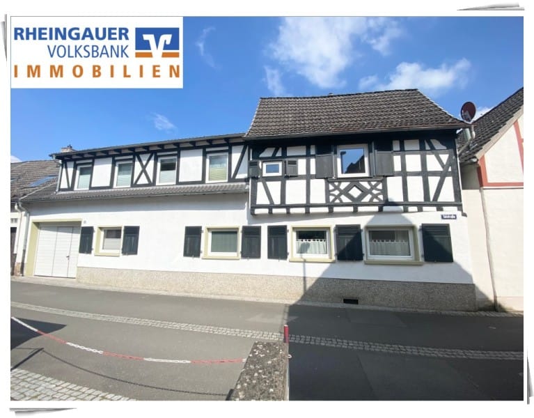 Immobilie in Kiedrich - ** Kiedrich: Einfamilienhaus mit Einliegerwohnung in ruhiger Anliegerstraße ** - Bild 0