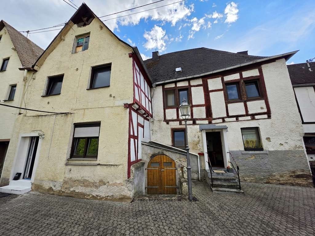 Immobilie in Rhens - Kapitalanlage in Rhens – solide Wohnimmobilie mit Entwicklungspotenzial - Bild 0