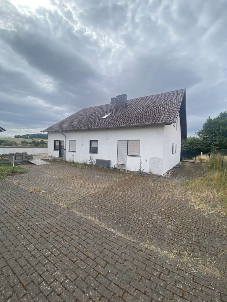 Immobilie in Konken - Dreifamilienhaus mit drei Garagen in ruhiger Seitenstraße - Bild 2