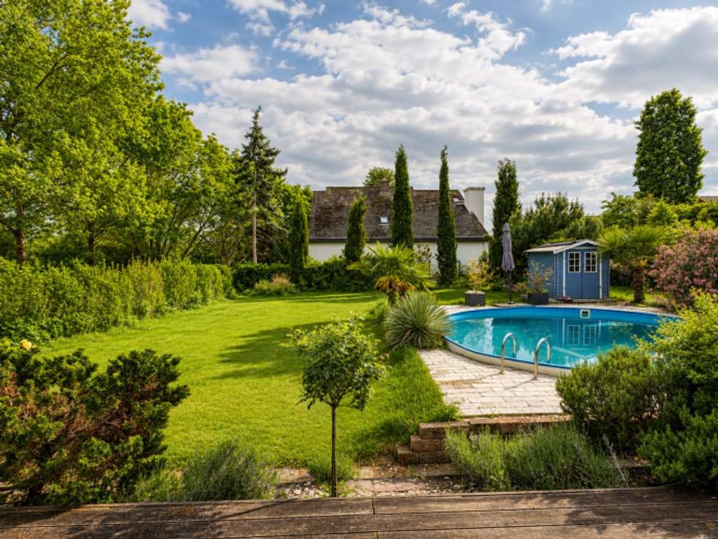Immobilie in Limburgerhof - Mediterrane Eleganz am Waldrand!
Großzügiges Wohnen + vielseitige Nutzung - Bild 1