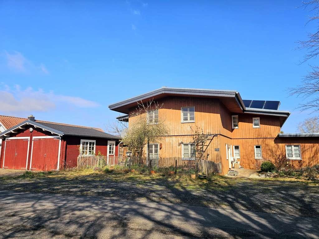 Immobilie in Hardegsen - Exklusives Massivholz-Haus mit vielseitiger Nutzung in idyllischer Lage - Bild 4