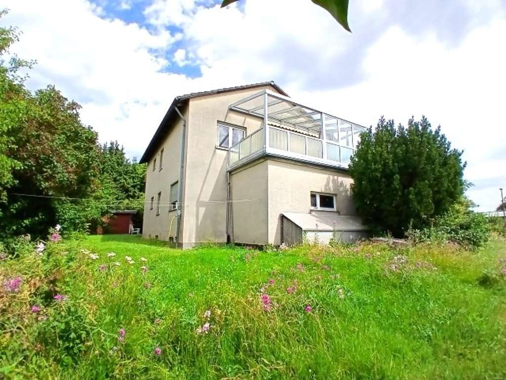 Immobilie in Ahnatal - Ahnatal-OT - Gepflegtes Zweifamilienhaus mit Grundstück - Bild 1