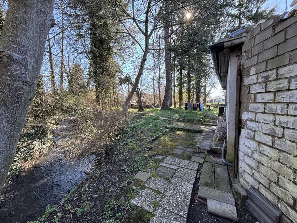 Immobilie in Aachen - Kleines, sanierungsbedürftiges Einfamilienhaus auf schönem Grundstück - Bild 4