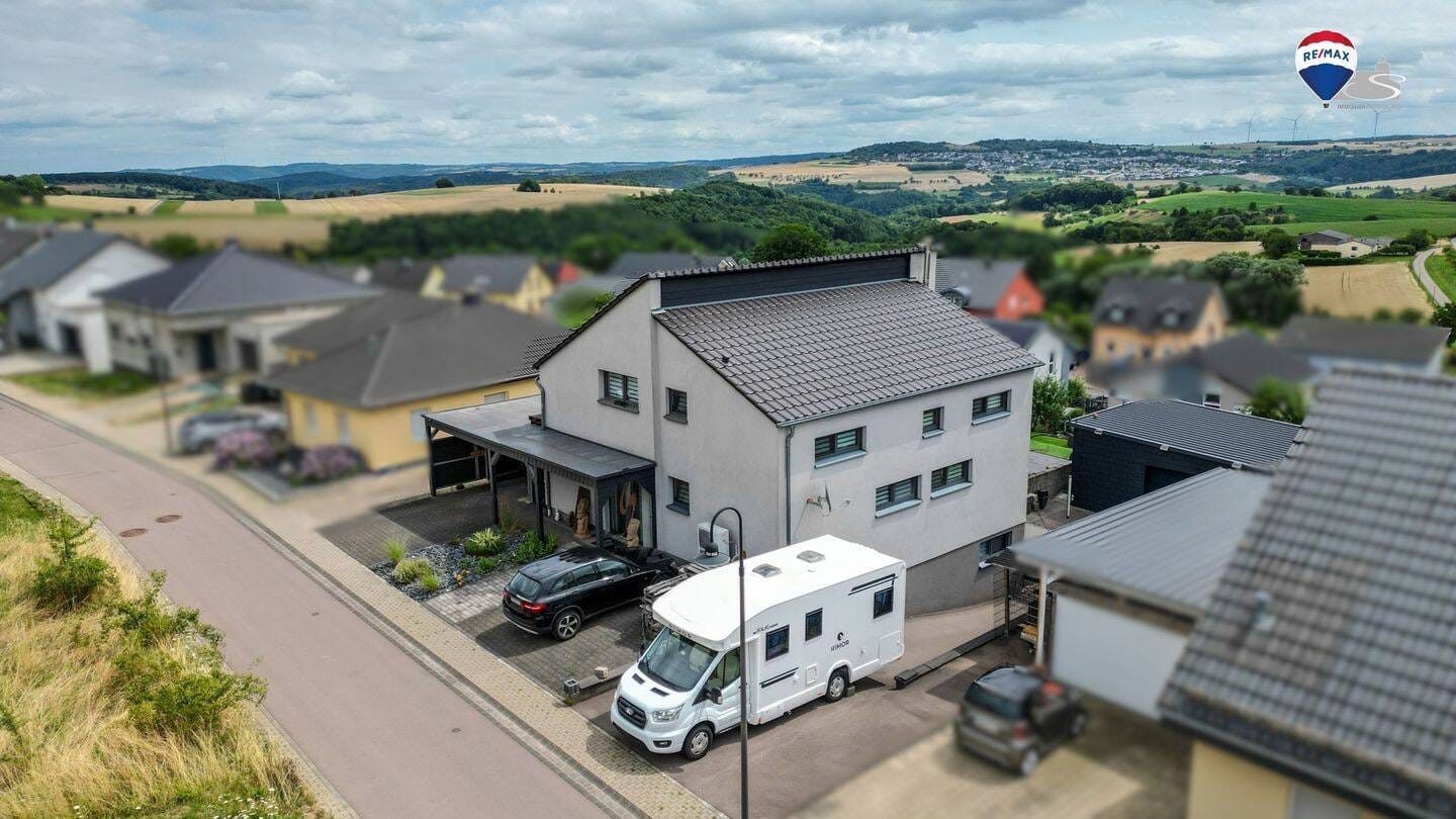 Immobilie in Kirf - Einziehen & wohlfühlen - modernes Zweifamilienhaus mit ELW & Wintergarten - Bild 4