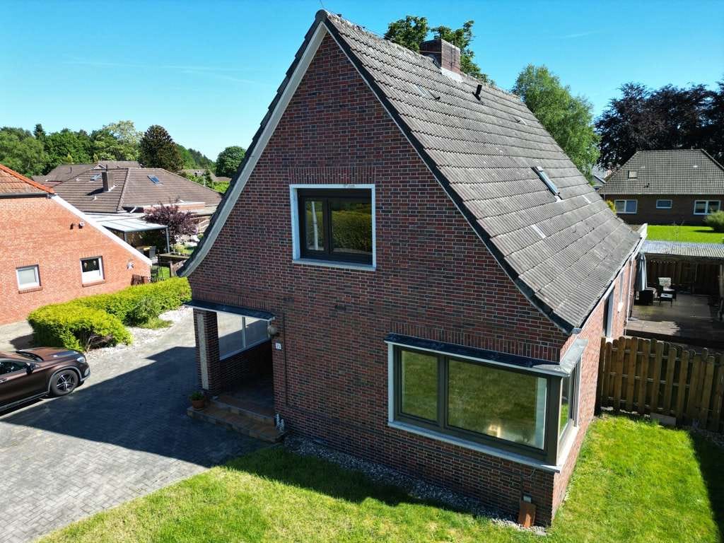 Immobilie in Moormerland - Einfamilienhaus mit Einliegerwohnung in
guter - zentraler Wohnlage - Bild 2
