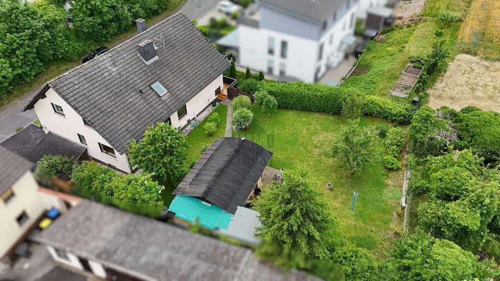 Immobilie in Neuhof - SELBST BEWOHNEN ODER ALS ANLAGE ? SIE ENTSCHEIDEN ! SOLIDE SUBSTANZ - TOLLE LAGE - MIT MIETEINNAHMEN - Bild 2