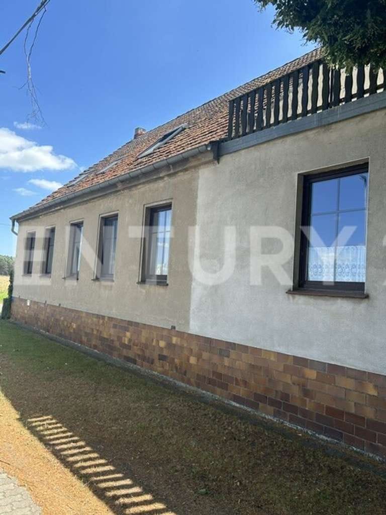 Immobilie in Nuthe-Urstromtal - Charmantes Zweifamilienhaus mit großem Nebengelass und vielseitigem Entwicklungspotenzial - Bild 1