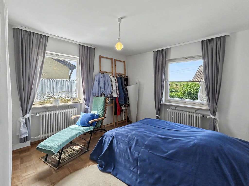 Immobilie in Ilsfeld - Freistehendes Wohnhaus mit zwei Wohneinheiten und Süd-Garten in Weinberglage in Ilsfeld-Schozach - Bild 4