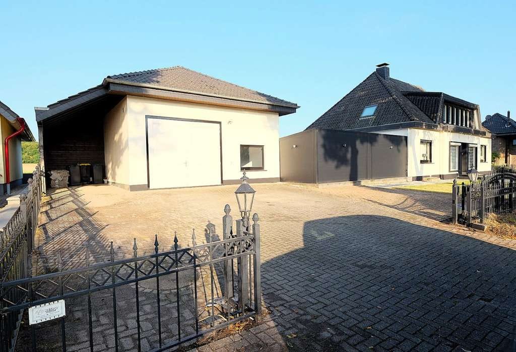 Immobilie in Kranenburg - Freistehendes Einfamilienhaus mit großer Garage und Wintergarten mit Panoramablick - Bild 3