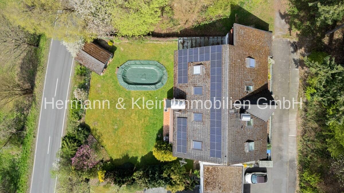 Immobilie in Eppstein - Attraktives Mehrfamilienhaus mit 5 Wohneinheiten, Pool, Kamin, Sauna & großem Grundstück - Bild 4