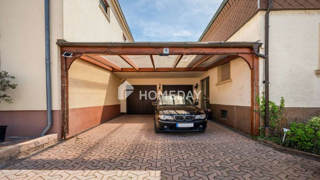 Immobilie in Graben-Neudorf - Familienhaus mit Garten, 2 Garagen, 7 Zimmern und 2. Baufenster in Graben Neudorf - Bild 1
