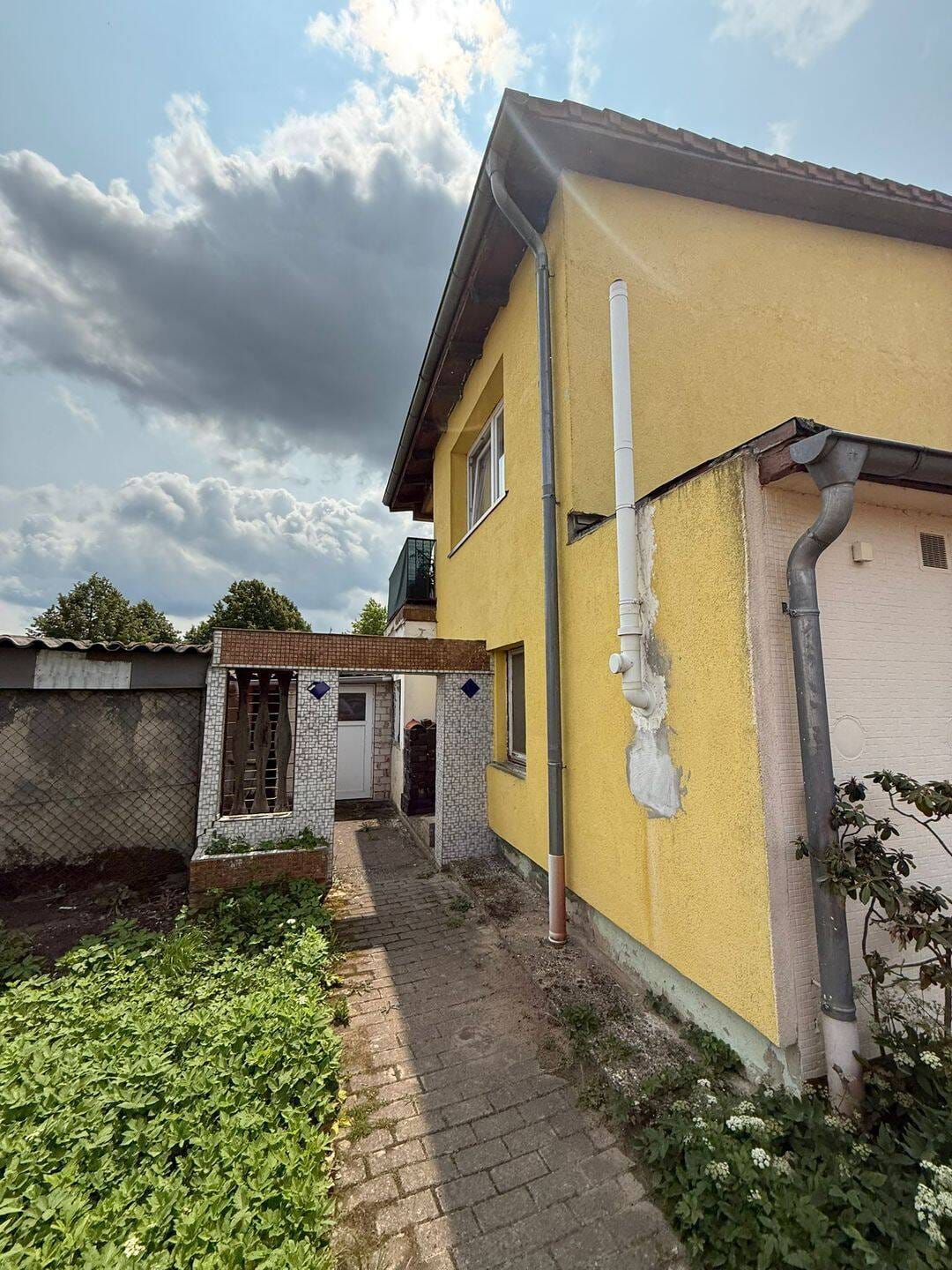 Immobilie in Heemsen - Gepflegtes Mehrfamilienhaus mit 7 Wohneinheiten & optionalem Baugrundstück in Heemsen - Bild 2