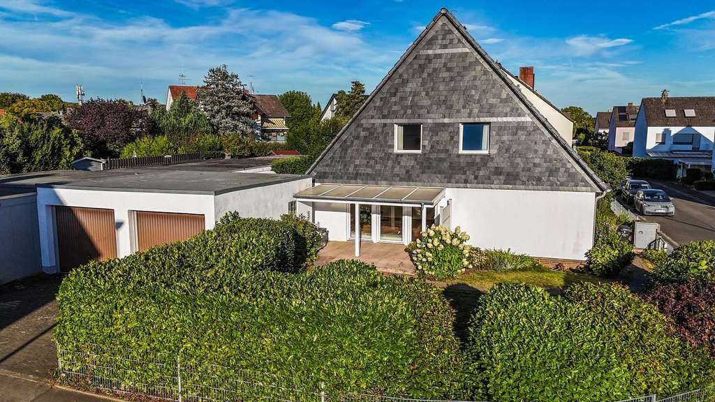Immobilie in Hofheim am Taunus - Zwei flexible Wohneinheiten mit Garten und Terrasse in Wallau - Bild 0
