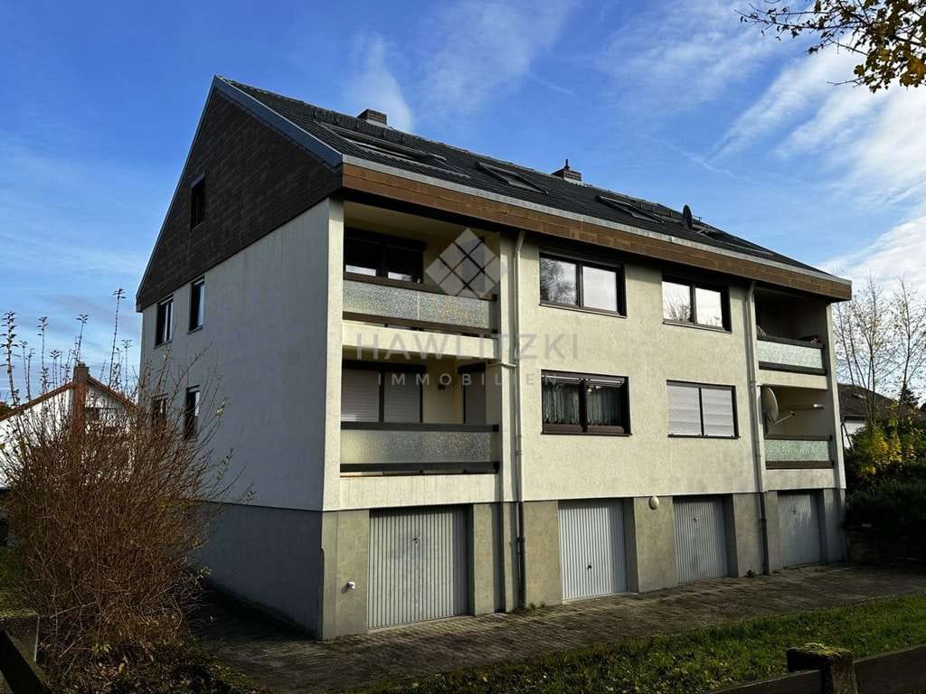 Immobilie in Wörth am Rhein - Große, vielseitige Maisonettewohnung in ruhiger Lage, mit Garten und Garage! - Bild 1