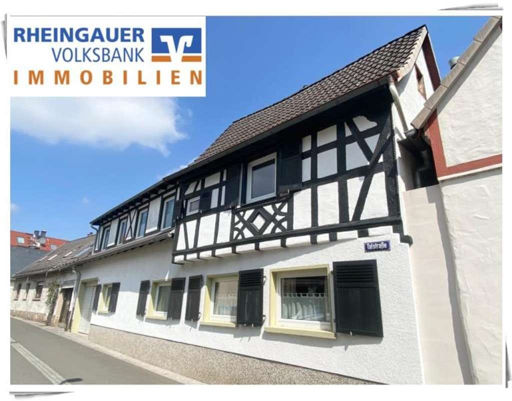 Immobilie in Kiedrich - ** Kiedrich: Einfamilienhaus mit Einliegerwohnung in ruhiger Anliegerstraße ** - Bild 0