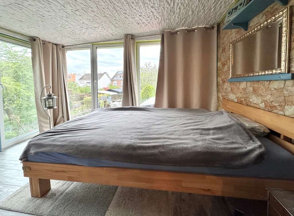 Immobilie in Troisdorf - Mehrfamilienhaus mit großem Garten und attraktiven Grundrissen - Bild 3