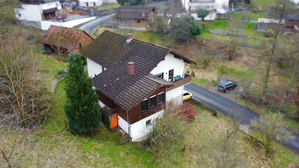 Immobilie in Bad Soden-Salmünster - Charmantes Mehrfamilienhaus mit großem Grundstück - Feldrandlage! - Bild 4