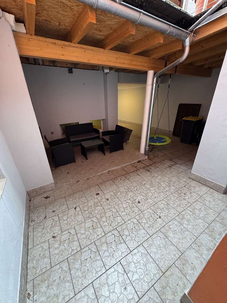 Immobilie in Rastatt - Zentrales Mehrfamilienhaus mit großer Terrasse, Garage & vielseitigem Nutzungspotenzial - Bild 2