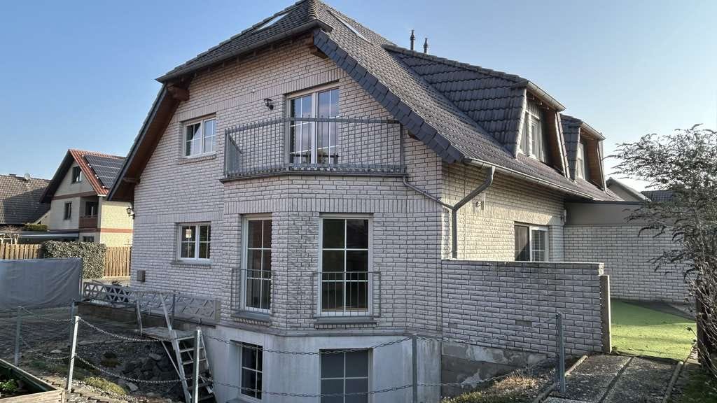 Immobilie in Melle - Doppelhaushälfte mit zwei Wohneinheiten in Melle-Buer. - Bild 1