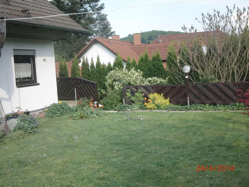 Immobilie in Gladenbach - ++ KRAG Immobilien ++ Familienhaus mit großem Garten und zwei Wohnebenen für neue Ideen ++ - Bild 1