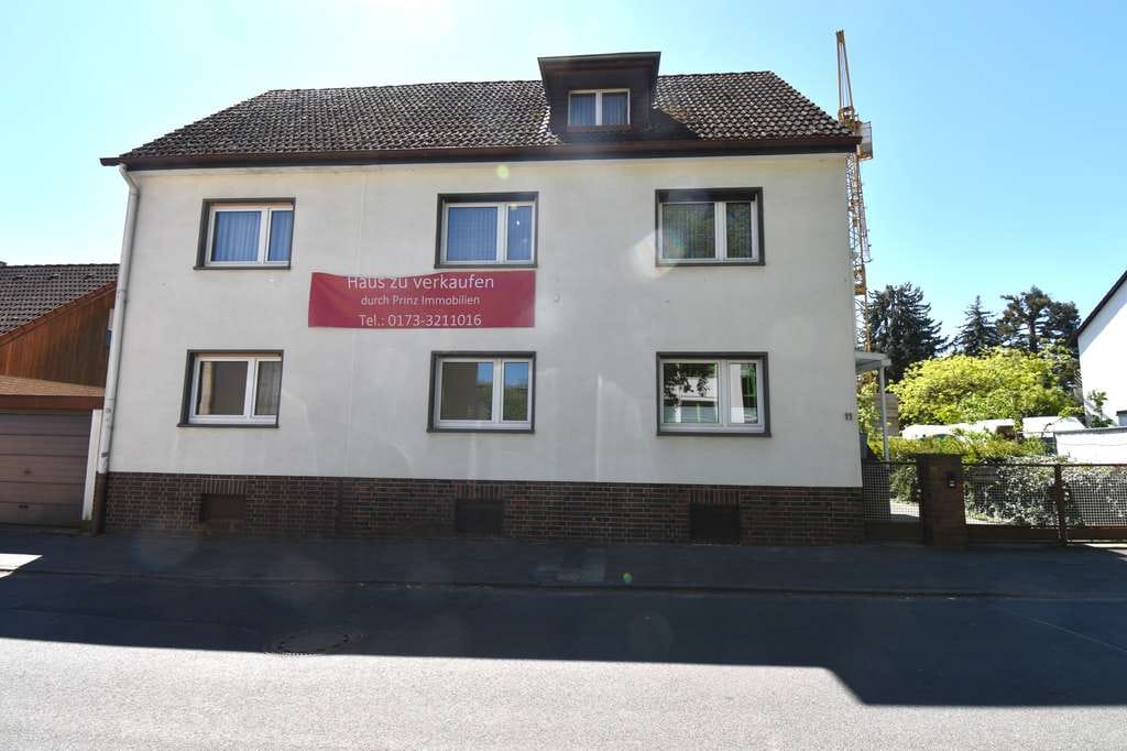 Immobilie in Kriftel - Freistehend & vollständig frei: Großzügiges Zweifamilienhaus mit Ausbau- und Erweiterungspotenzial - Bild 1