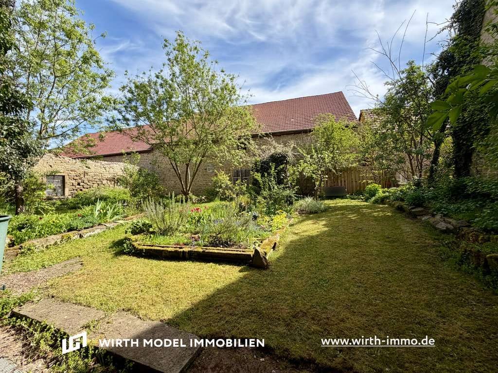 Immobilie in Waigolshausen - Einfamilienhaus mit Nebengebäude und Scheune in Waigolshausen OT Hergolshausen - Bild 0