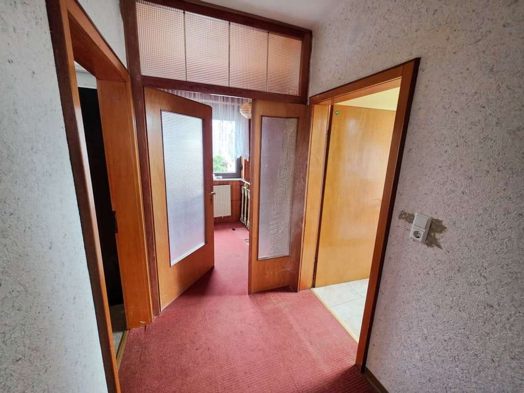Immobilie in Dunzweiler - 1‑Familienhaus mit Ausbaupotenzial: Garten, Südterrasse, 2 Garagen & optionale 2. Wohneinheit - Bild 3