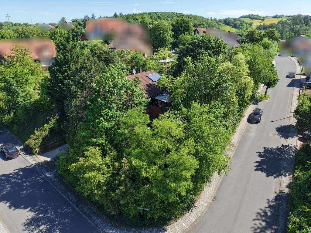 Immobilie in Grünsfeld - Charmantes Einfamilienhaus mit separater Einliegerwohnung in gefragter Lage von Grünsfeld
 - Bild 4