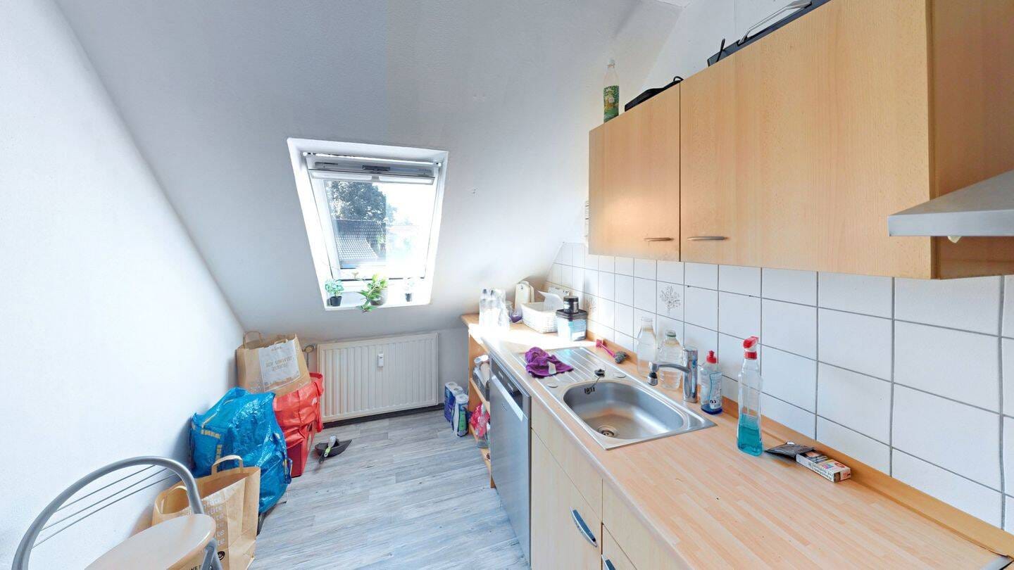 Immobilie in Osterholz-Scharmbeck - Attraktive u. vermietete 2-Zimmer-Dachgeschosswohnung mit Balkon in zentraler Lage von Osterholz-Scharmbeck - Bild 4