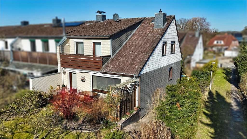 Immobilie in Schnakenbek - Endreihenhaus mit Vollkeller und Garage in kinderfreundlicher Lage! - Bild 2
