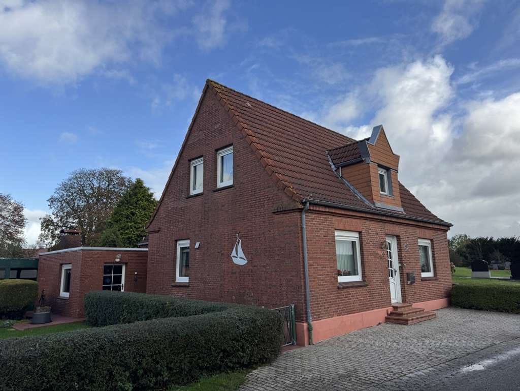 Immobilie in Moormerland - Direkte Aussicht auf Deich und Ems! Renovierungsbedürftiges Einfamilienhaus mit Garage & Nebengebäude in ruhiger Sackgassenlage - Bild 4