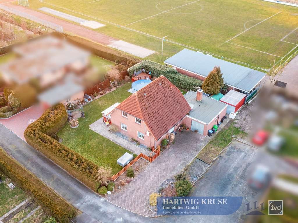Immobilie in Drochtersen - Vermietetes Einfamilienhaus in ruhiger Lage – mit Wintergarten und Garage - Bild 1