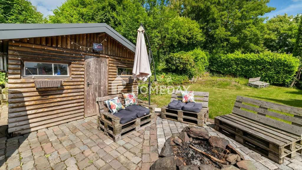 Immobilie in Hückeswagen - Exklusive Terrassenwohnung mit großem Garten, Kamin und besonderem Wohnflair - Bild 4
