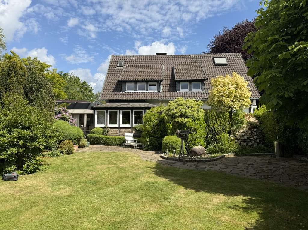 Immobilie in Reken - Lichtdurchflutetes Einfamilienhaus mit viel Potenzial und parkähnlichem Garten in Bahnhof Reken - Bild 0