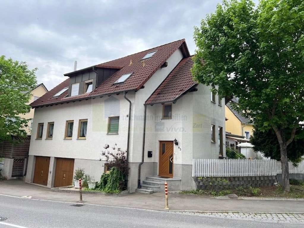 Immobilie in Ammerbuch - Provisionsfrei! Zweifamilienhaus mit Doppelgarage im Untergeschoss in Ammerbuch, OT Entringen - Bild 0