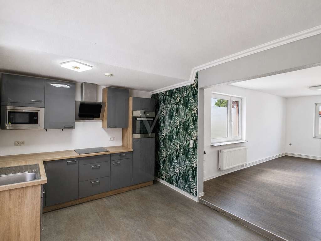 Immobilie in Dornum - Nordseecharme: Vielseitiges Einfamilienhaus in Westeraccumersiel - Bild 1