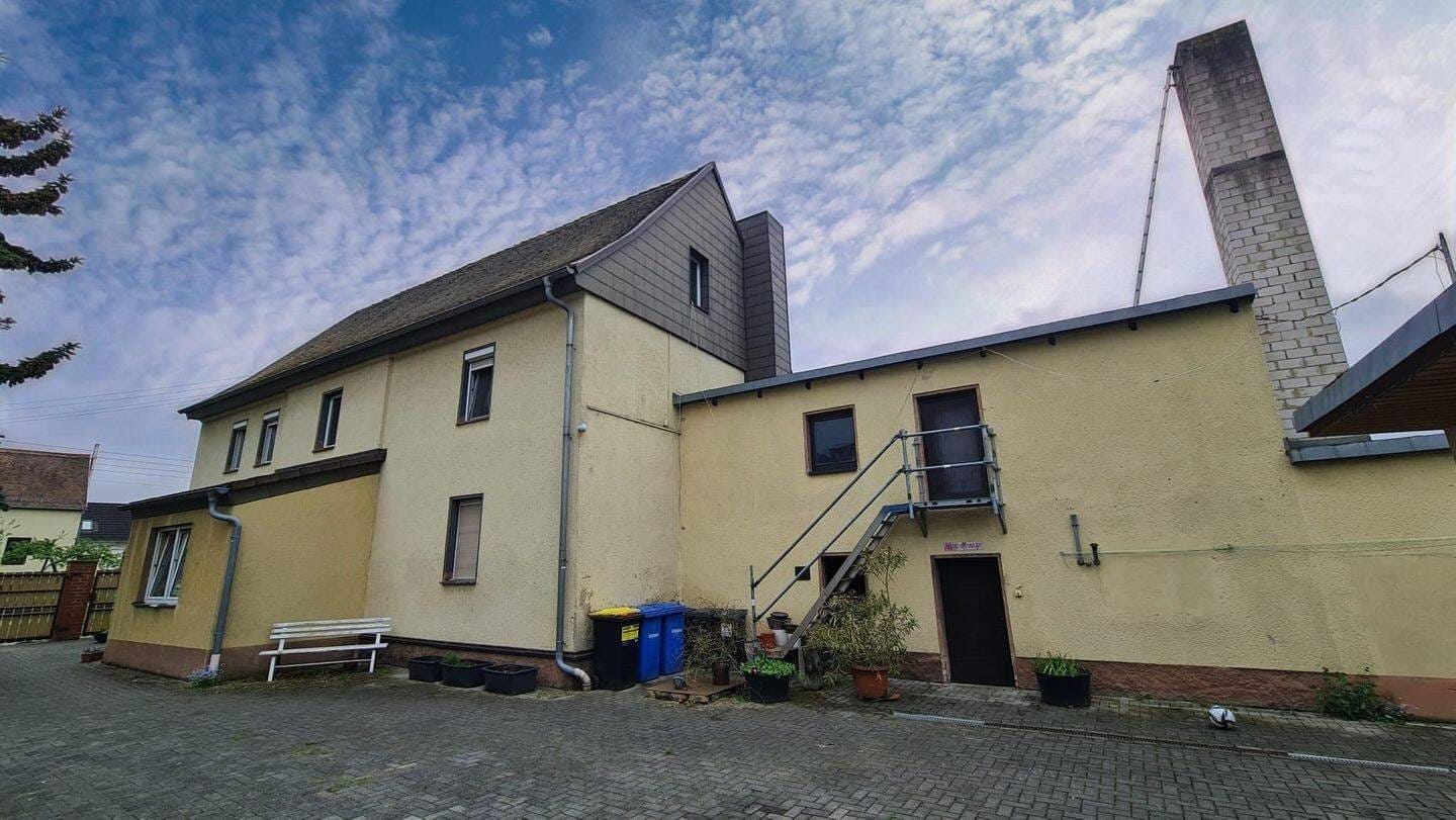 Immobilie in Schkeuditz - Einfamilienhaus mit zwei separaten Wohneinheiten, großem Garten und Sommer-Gartenhäuschen - Bild 3